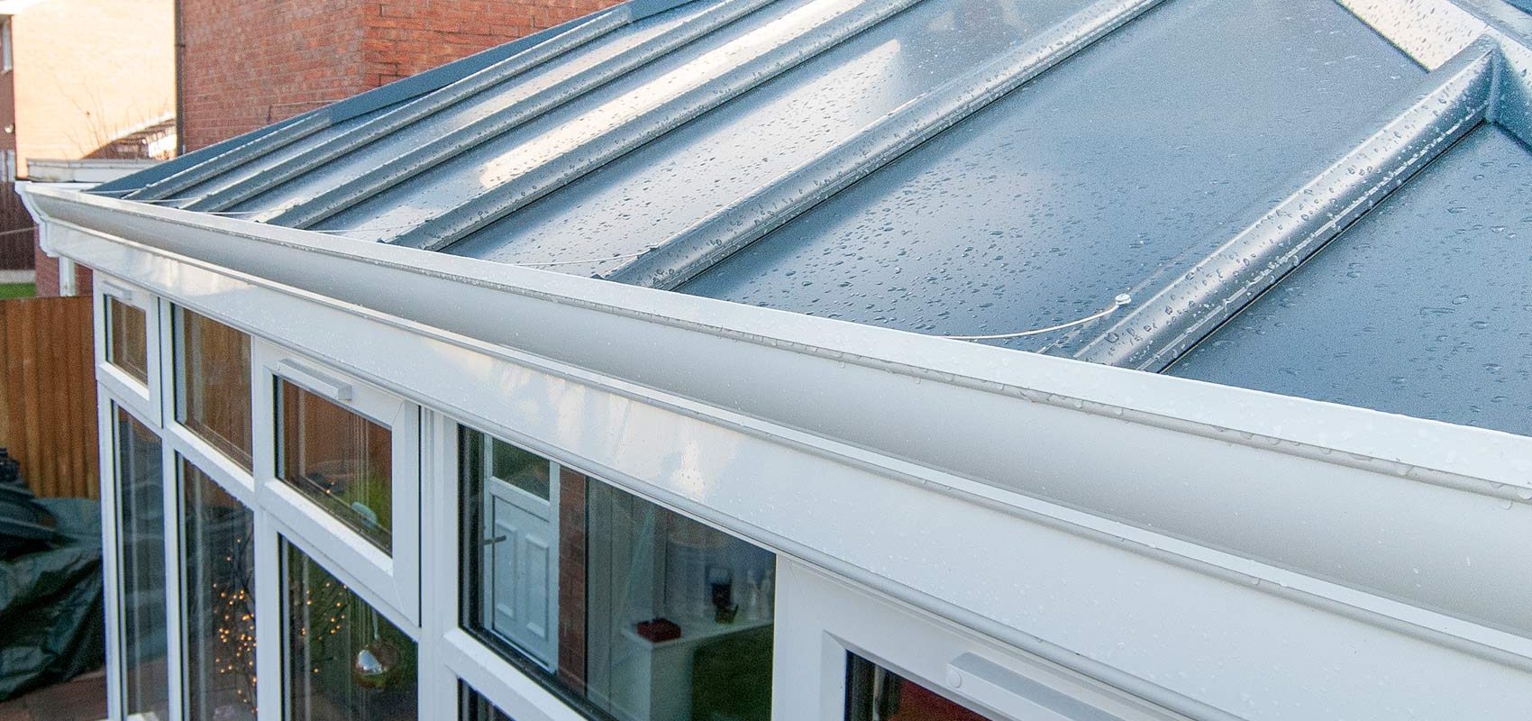  Stunning outside image of a T-Shaped Conservatory from Forest Edge Home Improvements